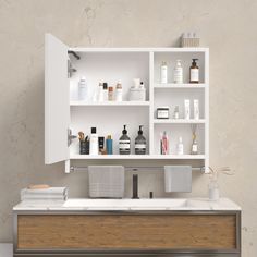 a bathroom counter with several bottles and soaps on the shelves above it, along with other personal care items