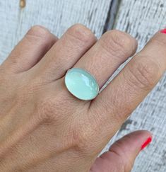 Horizontal Setting Astrological Aqua Chalcedony Oval Sterling Silver Solitaire Statement Ring | Boho | Chalcedony Ring | Gifts for Her by GildedBug on Etsy Oval Turquoise Moonstone Ring, Oval Turquoise Moonstone Ring In Sterling Silver, Turquoise Oval Moonstone Ring In Sterling Silver, White Oval Chalcedony Rings, Turquoise Chalcedony Gemstone Rings, Silver Oval Chalcedony Rings, Unique Silver Turquoise Ring With Oval Cabochon, Aqua Chalcedony Ring, Chalcedony Stone