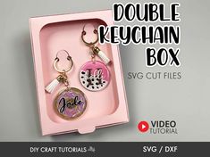 the double keychain box is pink with black and white designs