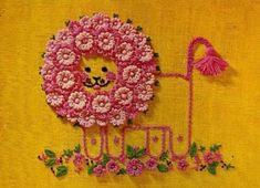 a pink flowered sheep with a flamingo on it's back is standing in front of a yellow background