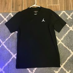 Never Worn, Will Take Best Offer Black Crew Neck Casual T-shirt, Casual Black Crew Neck T-shirt, Basic Black Shirt With Logo Print, Jordan Tshirt, Plain Black T Shirt, Jordan T Shirt, Jordan Shirts, Jordan Black, Jordans For Men