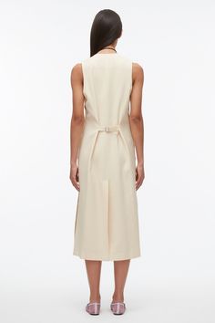 Classic H-line Midi Dress For Work, Elegant Structured Sleeveless Dress For Work, Structured Sleeveless Dress For Work, Chic Structured Sleeveless Midi Dress, Chic Midi Length Dress With Hidden Button Closure, Beige Sleeveless Midi Dress For Work, Chic Midi Dress With Hidden Button Closure, Tailored Sleeveless Dress For Workwear, Sleeveless Midi Dress With Structured Boning For Formal Occasions