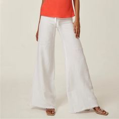 Wide Leg Linen Pocket Pant A Classic Wide-Leg Silhouette With A Drawstring Waist, These Linen Pants Make For The Perfect Easy Yet Sophisticated Look. 100% Linen Wide Leg Drawstrings Raw Edge Hem Machine Wash Cold Made In Usa Of Imported Fabric Questions? Leave A Comment Below! Casual Wide Leg Pants For Beach Season, White Non-stretch Pants For Beach, Versatile Fitted Bottoms For Vacation, Versatile White Wide Leg Loungewear Pants, White Cotton Pants For Beach Season, Mid-rise Pants For Beach In Summer, White Full Length Wide Leg Pants For Beach, Mid-rise Summer Beach Pants, Versatile White Loungewear Bottoms