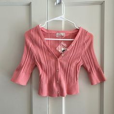 Nwt Uo Pink Cropped Cardigan Size Large Brand: Urban Outfitters Size: Large Color: Pink ~ Cropped Button Up Cardigan ~ Cropped Above The Waist In A Shrunken + Body-Hugging Silhouette With A Button Placket At The Front. ~ Ribbed, V-Neck, Button Closure, ~ New With Tags, Has Never Been Worn, And Is In Perfect Condition. #Urbanoutfitters #Cardigan #Croppedcardigan #Corporatebaddie #Balletcore Spring Barbiecore Spring V-neck Sweater With Button Closure, Fitted Sweater With Button Closure For Day Out, Summer Button-up Sweater With Buttons, V-neck Sweater With Buttons For Spring, V-neck Button Sweater For Spring, Fitted Cardigan With Button Closure For Day Out, Short Sleeve Cardigan With Button Closure For Fall, Casual Short Sleeve Cardigan With Button Closure, Fitted Cardigan With Buttons For Day Out