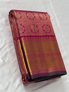 Bridal Collection Magenta Color Pure Kanchipuram Silk Saree | Indian Traditional Ethnic Saree | Wedding or Party Wear Saree | Handwoven Gift Saree for Her Product Details : Saree Type : Pure Kanchipuram Silk Saree Golden Zari, Silk Mark Certified Blouse Piece : Yes (Un-Stitched) Saree Length : 5.5 Meters Blouse Piece Length : 80 cm Saree Weight : 0.9 kg Saree Fabric : Pure Kanchipuram Silk  Color : As shown in the picture Work : weaving Pattern : designer Occasion: Party Wear, Formal Wear, Festi Traditional Pre-draped Saree For Wedding And Diwali, Gold Choli With Pallu For Traditional Ceremonies, Gold Choli With Zari Weaving For Wedding, Gold Saree With Traditional Patterns In Tissue Silk, Gold Choli With Zari Weaving For Traditional Ceremonies, Gold Paithani Silk Choli For Diwali, Gold Self-design Choli For Traditional Ceremonies, Gold Pre-draped Saree For Navratri, Gold Pre-draped Saree For Eid Ceremonies