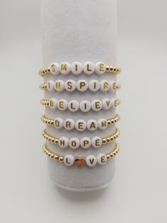 💫 Wear these positive affirmation bracelets as an inspirational reminder on your wrist 💫 Bracelets are handmade with 4mm 14k gold plated/silver plated beads and acrylic letter beads on double elastic strong cord.  Choose from the following inspirational words: Believe, Dream, Smile, Hope, Inspire or Brave.  For the LOVE bracelets please see the following listing: https://www.etsy.com/ie/listing/1395156306/the-love-collection-beaded-bracelets Please indicate what size bracelet you would like in Positive Words For Bracelets, Positive Affirmation Bracelets, Things To Write On Bracelets, Worded Bracelets, Bracelets Quotes, Affirmation Bracelets, Motivational Bracelets, Hope Bracelet, Faith Bracelet