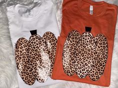 Welcome to Cotton and Pearls Vinyl!! Cheetah print pumpkin? Say no more! This unisex fit Bella canvas tee comes with the pumpkin design as shown above. Available on any of colors in the chart pictured. All designs are hand pressed with professional grade heat transfer vinyl. Please leave shirt color in the personalization box Sizes xs-3x Casual Leopard Print T-shirt For Fall, Fall Leopard Print Graphic T-shirt, Cheetah Print Pumpkin, Say No More, Pumpkin Fall, Pumpkin Shirt, Bella Canvas Tees, Fall Shirt, Pumpkin Design