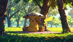 a pokemon pikachu sitting on a blanket in the grass next to some trees