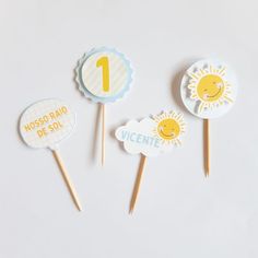 three lollipops with the numbers one, two and three sun on them