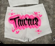 Designs by Galveston Airbrush! ♡ Feel free to contact me with any questions or custom orders.  ✧ Our Designs on these cute Booty style shorts are handmade with the artists' skilled Hands. The Design might look slightly different from the pictures or have small imperfections and that's okay, it's what makes them unique✧ Each design includes up to TWO names or words with up to THREE specified COLORS. SIZES: Available for ADULTS DESIGN PLACEMENT: All designs are airbrushed on the BACK of our cute shorts unless specified otherwise. Get more design ideas from our TikTok at @galvestonairbrush and Instagram at @Galveston_Airbrush. Follow your order process on our Insta Stories.  International orders may have an additional shipping charge. WASHING INSTRUCTIONS: º Wash it inside out in cold water º Customized Birthday Shorts, Shorts Birthday Outfit, Mix Baby Girl, Outfit Festival, Custom Airbrushing, Cute Birthday Outfits, Crop Top Set, Festival Shorts, Mixed Babies