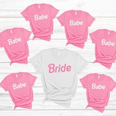 six bride shirts with the word babe on them in pink and white, sitting next to each other