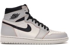 the air jordan 1 high top sneaker is available in white, black and grey