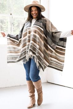 Keep warm this season in our trendy aztec poncho! These cozy aztec ponchos feature fringe along the bottom hem and an open front perfect for versatile layering. Poncho Outfit, Fringed Poncho, Cowgirl Hat, Cowgirl Hats, Birthday Gift Ideas, Mom Birthday, Mom Birthday Gift, Ponchos