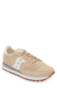 Built on decades of love from runners and sneaker fans alike, this foam-cushioned sneaker style offers enduring comfort and style. Lace-up style Leather and textile upper/textile lining/synthetic sole Imported Casual Cream Sneakers For Running, Beige Canvas Sneakers With Cushioned Footbed, Beige Low-top Running Sneakers, Beige Canvas Sneakers For Sports, Cream High-top Casual Running Shoes, Comfortable Beige Sneakers With Vulcanized Sole, Retro Beige Sneakers For Sports, Retro Beige Sports Sneakers, Beige Canvas Sporty Sneakers