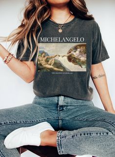 Comfort Colors Michelangelo Creation of Adam Shirt Italian Art T Shirt Clothes Art Lover Gift Classic Art tee Famous Artist Renaissance If you are looking for soft, comfy t-shirts, you're in the right place!. The hearty jersey fabric is knitted of the softest 100% cotton that's ring spun, they have retro and vintage look. + Shirts are unisex sizing. It's comfortable and flattering for men and women, but may run a little large for the ladies. Please refer to the sizing chart to find your perfect Dark Academia Art, Academia Art, National Park Shirt, Painting Aesthetic, Western Graphic Tees, Painted Clothes, Granola Girl, Aesthetic Clothing, Comfort Colors Tee