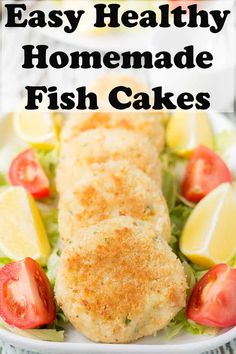 easy healthy homemade fish cakes on a plate with lemons, tomatoes and lettuce