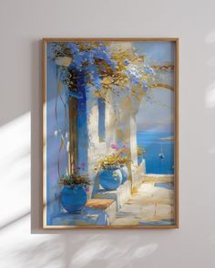 a painting hanging on the wall next to a vase with flowers in it and an open window