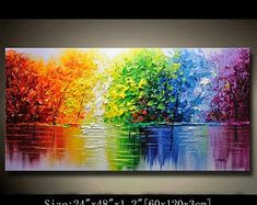 the colorful painting is displayed in front of a black wall and it looks like it has been