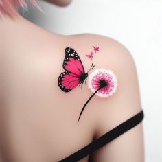 the back of a woman's shoulder with a pink butterfly and dandelion tattoo