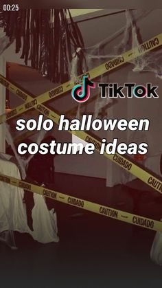 there is a halloween decoration with caution tape around it and the words tiktok