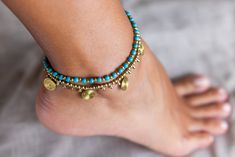 Shipping from Ibiza / Spain Have a piece of Ibiza and feel the island vibe. S H I P P I N G ∙ T I M E Europe: 1-2 weeks USA:  3-4 weeks Canada: 2-4 weeks Australia - 3-5 weeks Beautiful Turquoise Anklet. The anklet is made with waxed cotton, brass and turquoise stones. The locket is made with a stylish brass bell that goes into a hoop holding the anklet firmly.  Anklet length can be set to: 26 cm long (10.5 inches) Or 28 cm (11 inches). The listing is for a SINGLE anklet. T O P ∙  S E R V I C E Bohemian Turquoise Anklets For Festivals, Handmade Blue Beachy Anklets, Bohemian Turquoise Anklets For The Beach, Beachy Turquoise Anklets For Festival, Turquoise Beachy Anklets For Festival, Handmade Turquoise Anklet Bracelet, Turquoise Beachy Anklets For Vacation, Beachy Turquoise Anklets For Vacation, Turquoise Ankle Bracelet