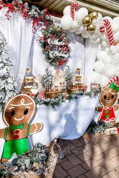 an outdoor christmas party with gingerbreads and decorations