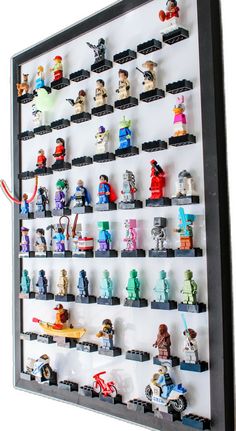 legos are arranged on the wall to look like they have been built into a display case