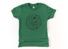 AMERICAN BEAR CUB® BIGFOOT CAMPING + BONFIRE YOUTH UNISEX SUPER SOFT SHIRTS An essential for every youth, our newest kid unisex super soft shirts fit like a well-loved favorite, featuring a crew neck and short sleeves. Designed with superior ring-spun cotton, rayon and poly giving you that amazingly soft feel that makes you wish you could wrap yourself up in them (feel free to do so). - Unisex sizing - Fabric is 25% combed & ring-spun ethically sourced cotton, 25% natural rayon fibers & 50% poly  - Sideseamed  - artwork is applied in an eco-friendly process (because we care about the environment) & gives this shirt a vintage look.   Write your choice of light or dark artwork in the personalization box (light artwork is recommended for darker color fabrics)  -------------------------------- Artwork Light, Camping Bonfire, Light Artwork, Fabric Artwork, Camp Shirts, Green Companies, Everglades National Park, Dark Artwork, Adventure Outfit