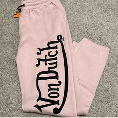 Brand New, Sealed In Poly Bag. Trendy Stretch Pink Joggers, Pink Stretch Trendy Joggers, Trendy Pink Stretch Joggers, Trendy Pink Leisure Pants, Trendy Pink Pants For Leisure, Pink Letter Print Bottoms For Streetwear, Trendy Pink Bottoms For Leisure, Spring Letter Print Loungewear Pants, Trendy Pink Sweatpants With Letter Print