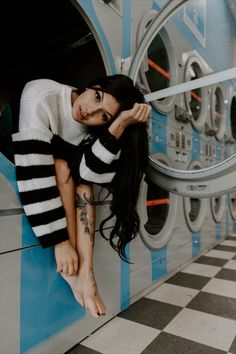 Model sitting inside washing machine in laundromat 80 Photoshoot Ideas, On Location Photoshoot, Laundry Photoshoot Ideas, Laundry Shoot Ideas, Laundry Mat Photoshoot, Quirky Photoshoot