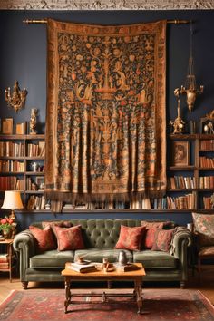 a living room filled with furniture and a tapestry hanging on the wall over a couch