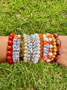 University of Tennessee themed game day bracelet stack. 5 strands included in one bracelet stack. Multi material beads on elastic cord. One size fits all. Prices are based on bead material and size. Tennessee Bracelets, Tennessee Vols, University Of Tennessee, Savannah Ga, Beaded Material, Bracelet Stack, Game Day, Arm Band, Friendship Bracelets