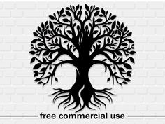 a tree with the words free commercial use in black on a white brick wall background