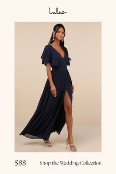 a woman in a long blue dress with the words shop the wedding collection on it