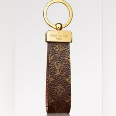 a key chain with a gold ring on it