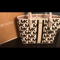 Michael Kors Jet Set Tote Bag 10.5h X 15.75w X 4.75d Handle Drop 9.5’ 100%Nauthentic 100% Polyester Lining Tote Bag Coated Canvas 90% Canvas 10% Polyester Gold Tone Hardware Clip Fastening Crafted From Durable Canvas That’s Detailed With Bold Stripes , Spacious Interior To Store All Your Personal Items.... Wallet, Phone,Tablet, Makeup Bag Etc.... Brand New And Still Inside Shopping Bag Coated Canvas Bags With Lined Interior For Shopping, Coated Canvas Shopping Bags With Lined Interior, Shopping Bags With Lined Interior In Coated Canvas, Lined Interior Satchel Bag, Shopping Bags With Lined Interior And Coated Canvas, Modern Bag With Lined Interior, Designer Rectangular Shoulder Bag With Lined Interior, Designer Tote Bag With Lined Interior, Luxury Rectangular Bag With Lined Interior