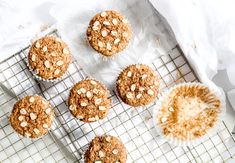 six oatmeal muffins cooling on a wire rack