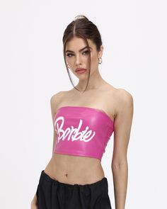 Model (WearingS):• Height: 171cm | Bust: 83cm | Waist: 59cm | Hips: 89cmDetails: PU-fabric tube top piece with letter print in frontLength: CroppedSleeve Length: SleevelessMaterials:95% Polyester + 5% Spandex Summer Party Crop Top With Letter Print, Trendy Pink Strapless Top, Trendy Pink Bandeau Top, Sleeveless Graphic Print Crop Top For Party, Sleeveless Crop Top With Graphic Print For Party, Trendy Party Tops With Slogan, Trendy Slogan Tops For Party, Y2k Bandeau Party Top, Spring Party Tops With Text Print