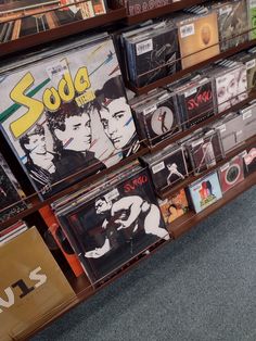 there are many cd's on display in the store