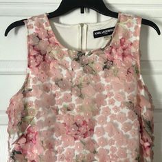 Karl Lagerfeld Flower Appliqu Dress. Has Floral Background With Pink Delicate Flowers. Size 10. Never Worn. Pink Sleeveless Feminine Floral Dress, Pink Floral Embroidered Dress For Summer, Chic Pink Floral A-line Dress, Chic Pink A-line Floral Dress, Sleeveless Floral Dress For Formal Occasions, Elegant Pink Floral Dress For Spring, Elegant Pink Floral Dress For Garden Party, Pink Silk Dress With Floral Embroidery, Pink A-line Floral Dress