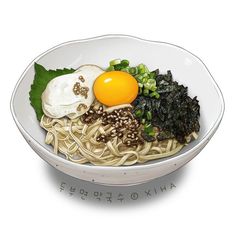 a white bowl filled with noodles, meat and an egg on top of it's side