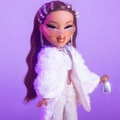 a doll with long hair wearing a white outfit and holding a bottle in her hand