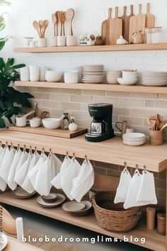 the kitchen counter is filled with dishes and cups