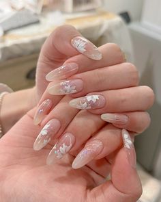 spring floral flower glittery long almond shaped gel x nail tip Silver Floral Nails, Apres Gel X Nails Wedding, Fairy Nail Inspiration, Wedding Nails Long Almond, Nail Extensions Wedding, Nails For Champagne Dress, Almond Floral Nails, Almond Shape Nails Designs, Almond Shaped Nails Designs