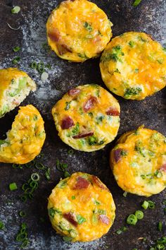 several small muffins with bacon and cheese on top