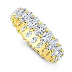 Alexandra Jules’ custom ‘Oval Diamond Eternity Band’ is crafted with approximately 3.5-carats of the highest quality collection diamonds; hand-set in 18-karat yellow gold.  This 'Oval Diamond Eternity Band looks absolutely stunning as a wedding band or stacked with other rings.   This band is also available in 18-karat pink or white gold. Platinum setting available upon request. Baguette Band, Baguette Diamond Band, Diamond Eternity Band, Custom Bridal, Eternity Band Diamond, Fine Jewelry Designers, Diamond Eternity, Eternity Band, Baguette Diamond