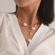 Elevate your look with this gleaming paper clip chain lariat necklace, highlighted with three brilliant pearls. Chain : 20.08" L Pearls: 0.59" diameter 18k gold-plated copper / pearl Gold Neck Chain, Copper Pearl, Elevate Your Look, Collar Jewelry, Lariat Necklace, Paper Clip, Types Of Metal, 18k Gold, Gold Tones