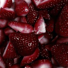 closeup of strawberries with water droplets on them