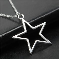 Beautifully crafted with vintage appeal, this Geometric Silver Color Hollow Star Necklace is stunningly crafted with Zinc alloy! Capture lasting style with this must-have accessory. DETAILSMaterial: MetalMetals Type: Zinc alloyStyle: VintageShape\pattern: Geometric Star Charm Necklace, Star Pendant Necklace, Mens Jewelry Necklace, Antique Pendant, Charm Necklace Silver, Sparkle Jewelry, Star Charms, Star Pendant, Leather Chain