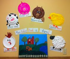 a bulletin board with paper plates and farm animals on it